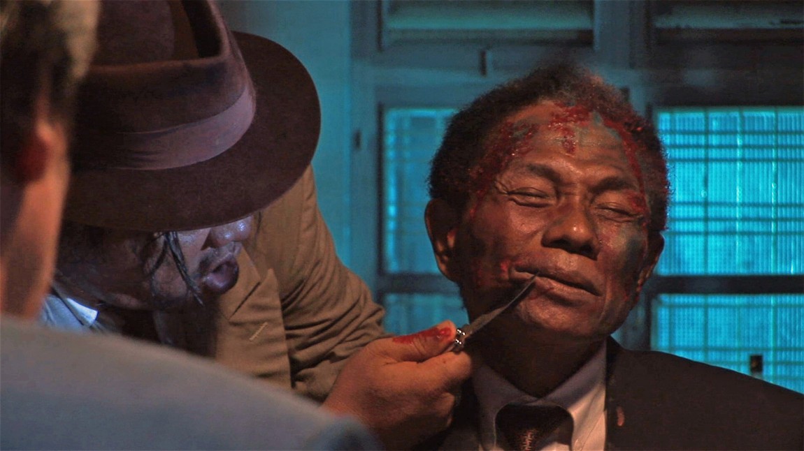 Anwar Congo spiller offer i en regissert scene i The Act of Killing (Foto: Tour de Force).