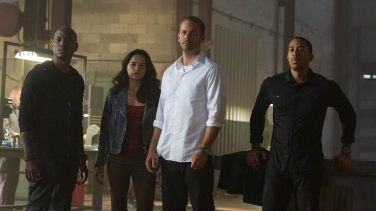 Tyrese Gibson, Michelle Rodriguez, Paul Walker og Ludacris i Fast And Furious 7 (Foto: United International Pictures).