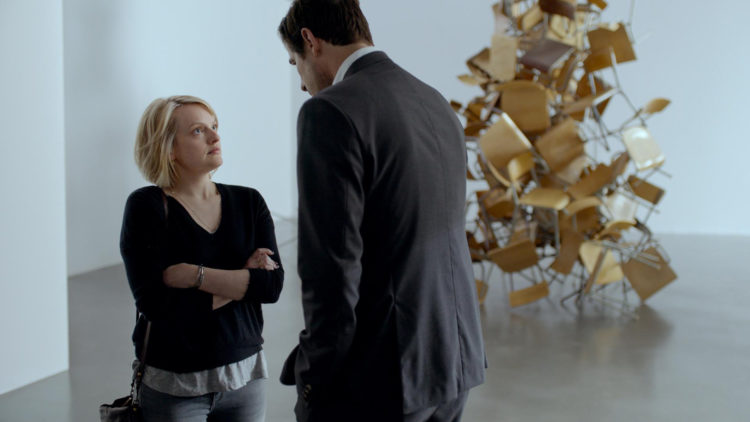 TV-reporteren Anne (Elisabeth Moss) konfronterer kuratoren Christian (Claes Bang) i "The Square". (Foto: Arthaus)
