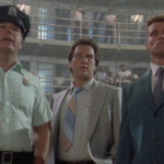 Allan Graf, James Belushi og Arnold Schwarzenegger i Red Heat. (Foto: Universal)