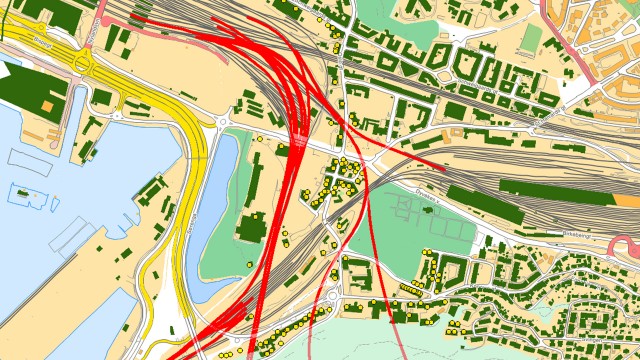 De røde strekene indikerer hvor jernbanesporene vil gå. (Foto: Bioforsk/Jernbaneverket)